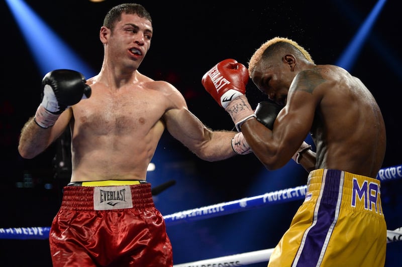 Subriel Matias (yellow trunks) and Petros Ananyan (red trunks) box during their super lightweight bout at MGM Grand Garden Arena, Las Vegas.  Reuters