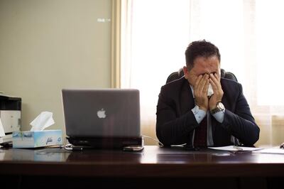 ERBIL, IRAQ: Hazhar cries over his father, a peshmerga who disappeared during the Kurdish Civil War. Photo by Sebastian Meyer 