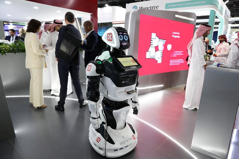 A robot does the rounds on the first day of Arab Health at the Dubai World Trade Centre. Pawan Singh / The National