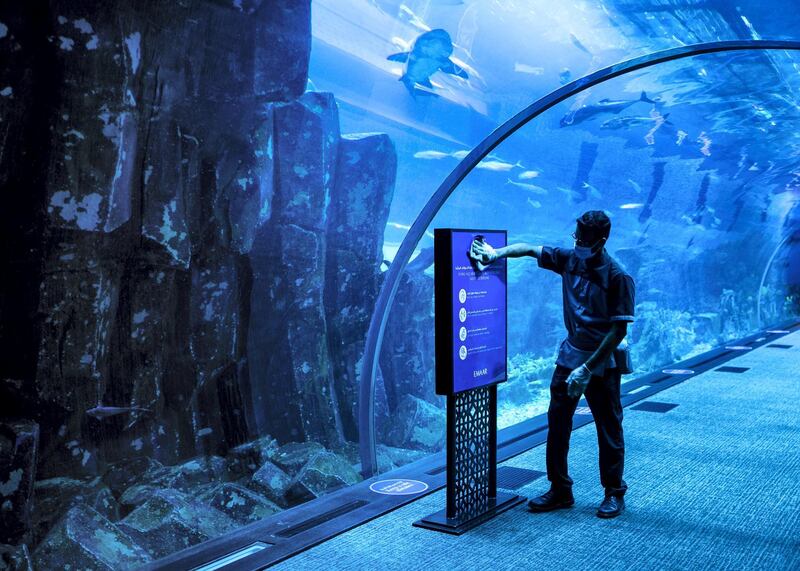 DUBAI, UNITED ARAB EMIRATES. 11 JUNE 2020. 
Signs requiring people to social distance at Dubai Mall’s Dubai Aquarium and Underwater Zoo
(Photo: Reem Mohammed/The National)

Reporter:
Section: