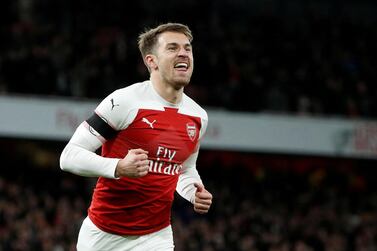 FILE PHOTO: Soccer Football - Premier League - Arsenal v Fulham - Emirates Stadium, London, Britain - January 1, 2019 Arsenal's Aaron Ramsey celebrates scoring their third goal. Action Images via Reuters/John Sibley EDITORIAL USE ONLY. No use with unauthorized audio, video, data, fixture lists, club/league logos or 'live' services. Online in-match use limited to 75 images, no video emulation. No use in betting, games or single club/league/player publications. Please contact your account representative for further details./File Photo