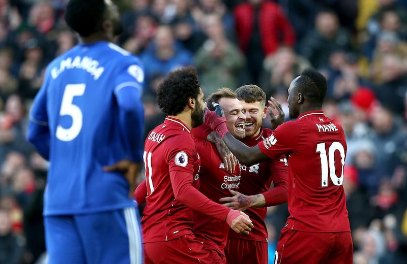 LIVERPOOL, ENGLAND - OCTOBER 27:  Xherdan Shaqiri of Liverpool celebrates with teammates after scoring his team's third goal during the Premier League match between Liverpool FC and Cardiff City at Anfield on October 27, 2018 in Liverpool, United Kingdom.  (Photo by Jan Kruger/Getty Images)