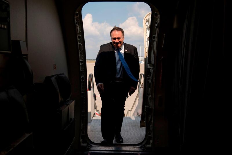 US Secretary of State Mike Pompeo boards his plane at Brussels Airport in Zaventem, Belgium on July 12, 2018, to travel to Washington, Dc.  Pompeo was on a trip traveling to North Korea, Japan, Vietnam, Afghanistan, Abu Dhabi, and Brussels. - 
 / AFP / POOL / Andrew Harnik
