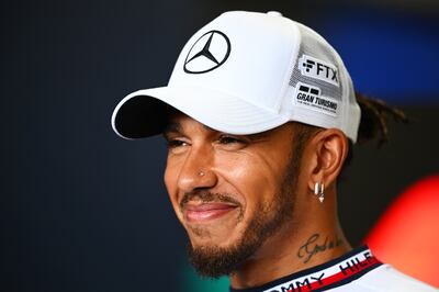 Lewis Hamilton of Great Britain and Mercedes talks to the media in the Paddock during previews ahead of the F1 Grand Prix of Japan at Suzuka. Getty Images
