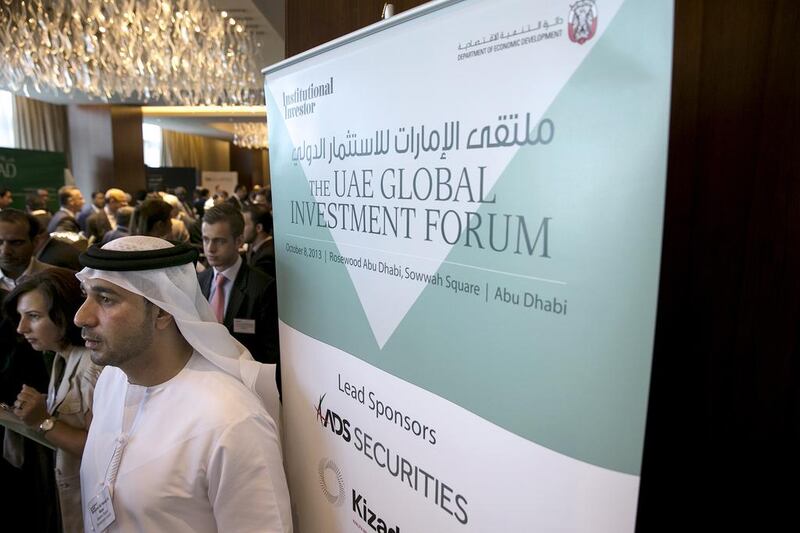 Guests engage in a discusson before start of the 6th Annual Global UAE Investment Forum. Silvia Razgova / The National