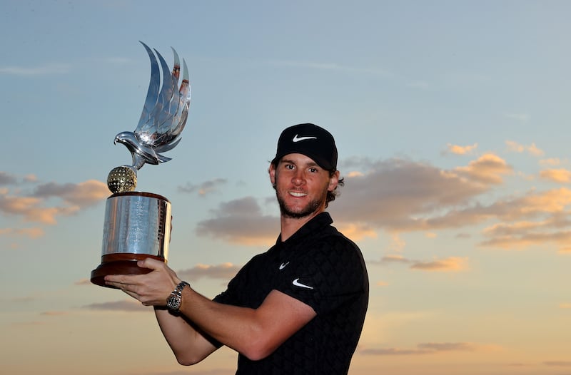 Thomas Pieters of Belgium poses with the Falcon Trophy after winning the Abu Dhabi HSBC Championship at Yas Links Golf Course on January 23, 2022. Getty