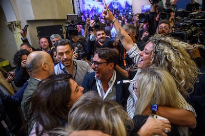 Supporters of Giorgia Meloni, leader of the Brothers of Italy, after her press conference at the party electoral headquarters in Rome. Getty 