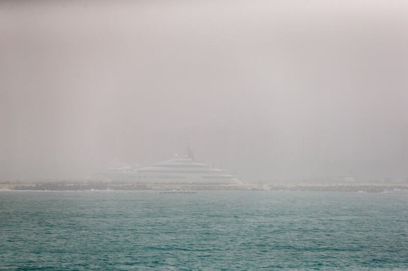 DUBAI, UAE. March 16, 2014- The Dubai Marina skyline is cloaked with dust as seen from the Palm Jumeirah in Dubai, March 16, 2014. (Photo by: Sarah Dea/The National, Story by: STANDALONE, News)
