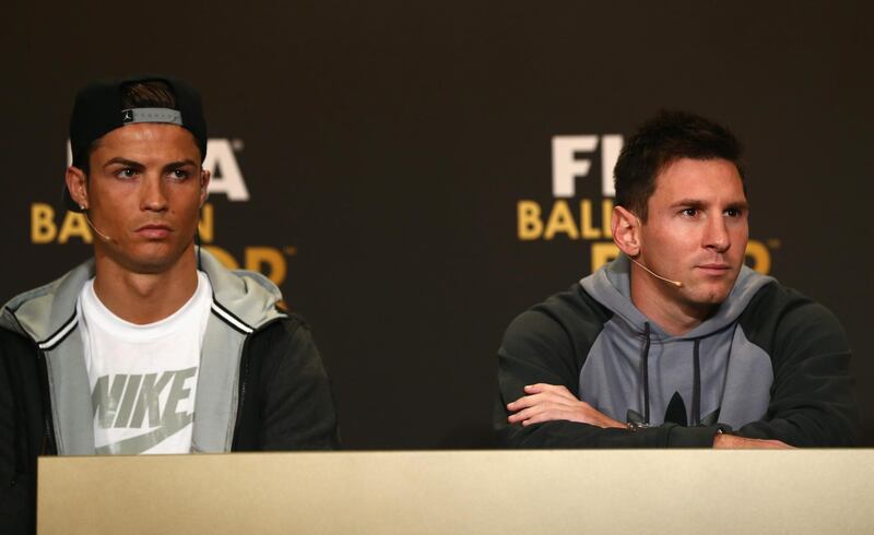 ZURICH, SWITZERLAND - JANUARY 13: Cristiano Ronaldo (L) of Portgal and Lionel Messi of Argentina attend the FIFA Ballon d'Or 2013 press conference with nominees for Men's Football World Player of the Year and World Coach of the Year at the Kongresshalle on January 13, 2014 in Zurich, Switzerland.  (Photo by Martin Rose/Bongarts/Getty Images)