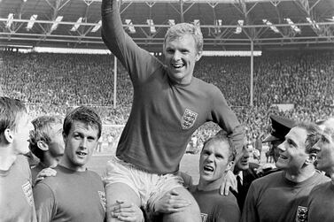 England's triumphant 1966 World Cup final captain Bobby Moore with the Jules Rimet Trophy in 1966. PA