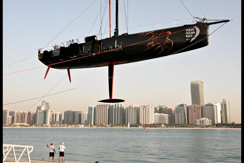 January 9th, 2012 -- Corniche, Abu Dhabi --
Abu Dhabi Ocean Racing's boat "Azzam" is lower back into the water at the Volvo Ocean Race Destination Village located on the Corniche breakwater ahead of the in-port race on Jan 13th. Fatima Al Marzooqi / The National