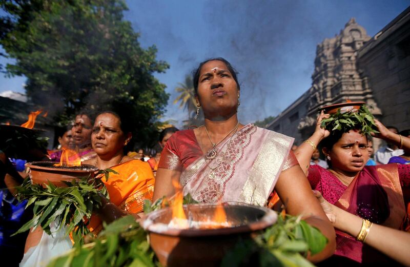 Hindu devotees pray during the annual Theru festival in Colombo, Sri Lanka. Dinuka Liyanawatte / Reuters