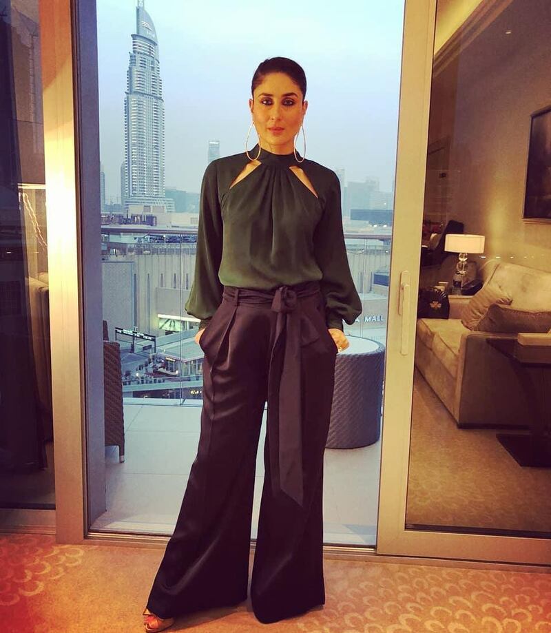Kareena opted for wide legged trousers from Atsu, and an emerald blouse with cutouts. Courtesy Instagram 