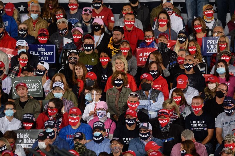 Supporters listen as President Donald Trump speaks at a campaign rally at Atlantic Aviation on September 22, 2020 in Moon Township, Pennsylvania. AFP