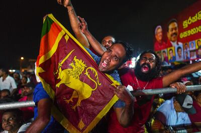 Supporters of Sri Lanka Podujana Peramuna (SLPP) party presidential candidate Gotabhaya Rajapaksa shout slogans during a campaign rally in Homagama on November 13, 2019, ahead of the November 16 presidential election. Police stepped up security across Sri Lanka on November 13 over fears of violence on the final day of campaigning for the fiercely contested presidential election, officials said. / AFP / Jewel SAMAD
