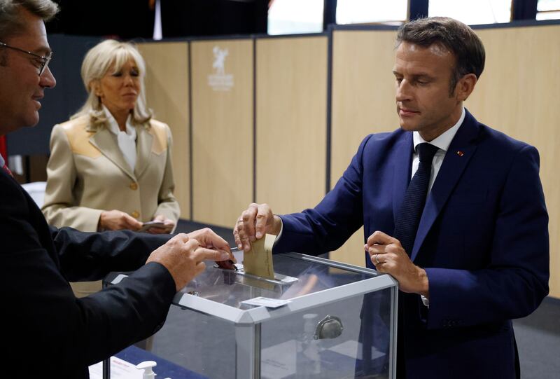 Emmanuel Macron and his wife Brigitte voted in Le Touquet in the first round of legislative elections on Sunday. EPA