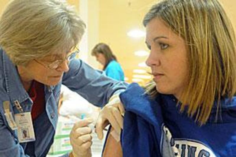 A pregnant woman receives an H1N1 vaccine in the US. The UAE is now in the final stages of preparing its vaccination programme.