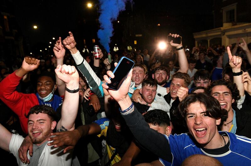 Chelsea supporters celebrate in streets surrounding their Stamford Bridge stadium in London their Champions League victory. PA