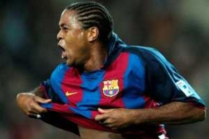 FC Barcelona Dutch Patrick Kluivert celebrates his first goal against Athletic de Bilbao in a Liga match at Camp Nou Stadium in Barcelona 17 January 2004.