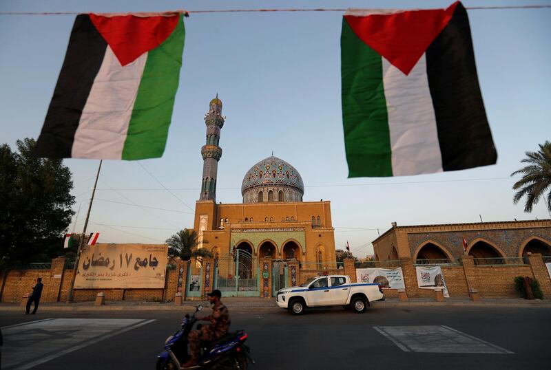 Palestinian flags are hung at the Al Firdous Square during the annual Al Quds Day (Jerusalem Day) on the last Friday of Ramadan in Baghdad, Iraq. Reuters