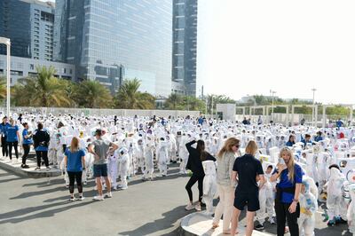 Hundreds of pupils took part in the record-breaking event at Repton Abu Dhabi's Fry Campus on Reem Island. Khushnum Bhandari / The National

