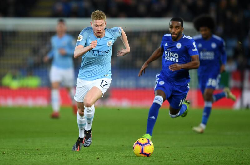 Kevin De Bruyne of Manchester City and Ricardo Pereira of Leicester City chase after the ball. Getty Images