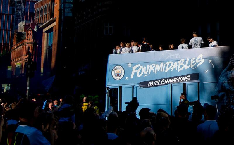 Manchester City's players react on top of the bus during the Champions Parade, Manchester, Britain.  EPA