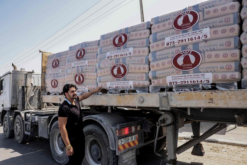 A truck carrying cement to Palestinians arrives at the Kerem Shalom crossing in Rafah in the southern Gaza Strip. AFP