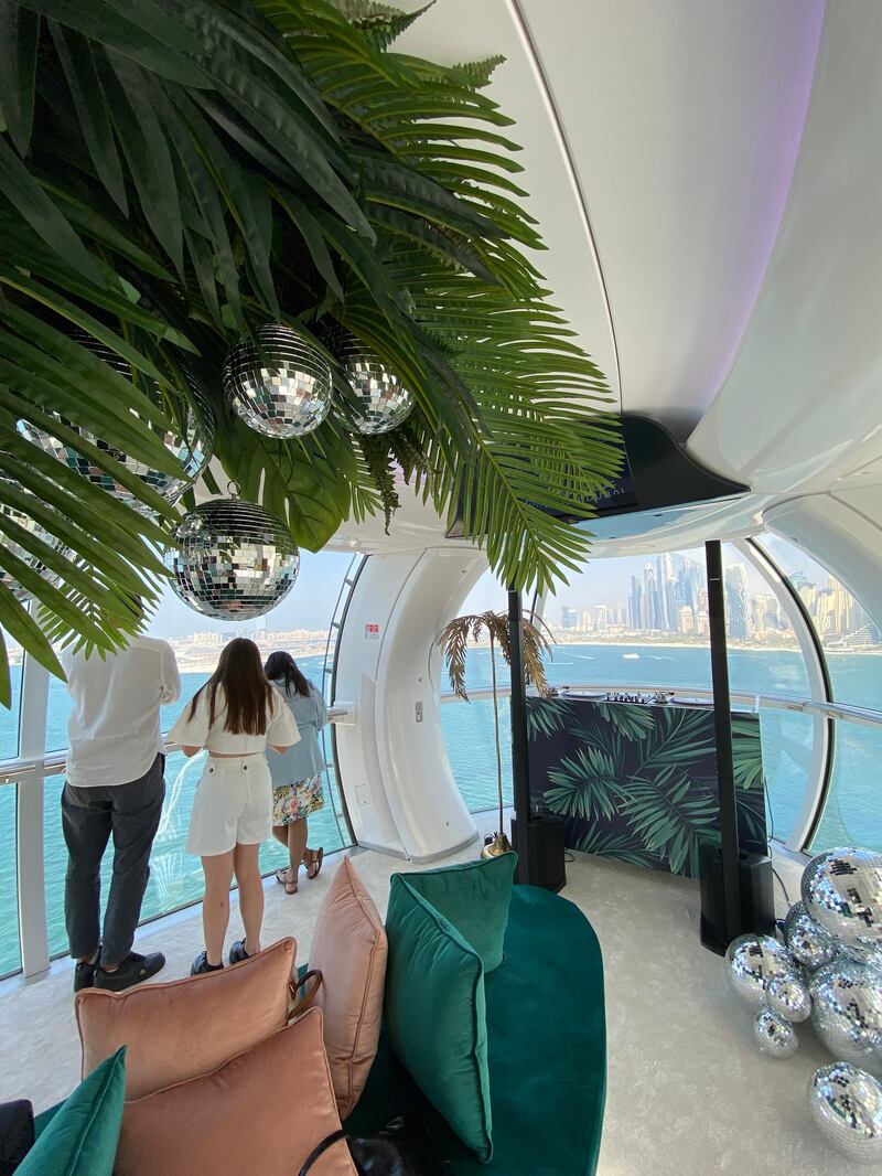 A DJ booth is seen in one of the Ain Dubai capsule pods. Photo: Thoraya Abdullahi / The National