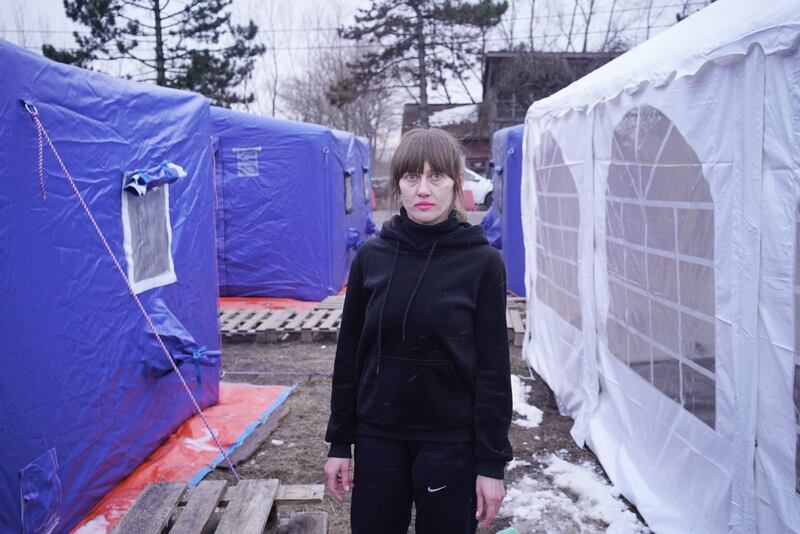Maria, 38, from Chernihiv, left Ukraine with a friend. They came to the Romanian border to wait for another friend before crossing. Photo: Panos Pictures
