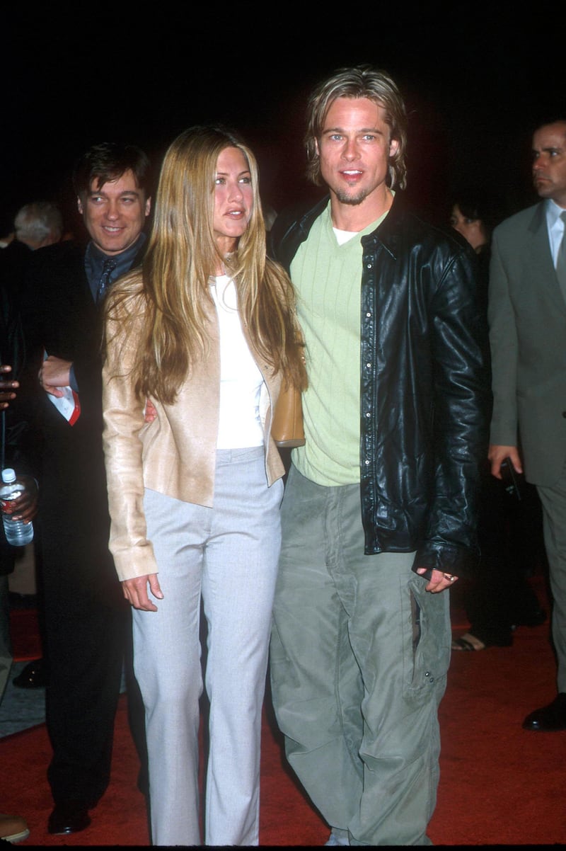 371747 01: Brad Pitt & Jennifer Aniston attending the Los Angeles Premiere of the new movie "Erin Brockovich". Westwood, California. March 14,2000. (Photo by: Brenda Chase Online USA Inc./Liaison Agency)