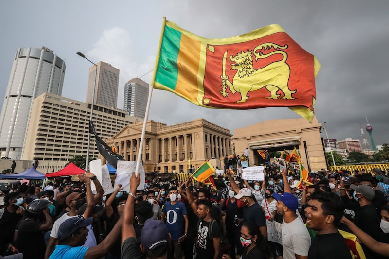 Demonstrators in Sri Lanka gather outside the Presidential Secretariat  in Colombo as the country faces shortages in food, fuel and medicines after defaulting on its $51 billion debt. EPA
