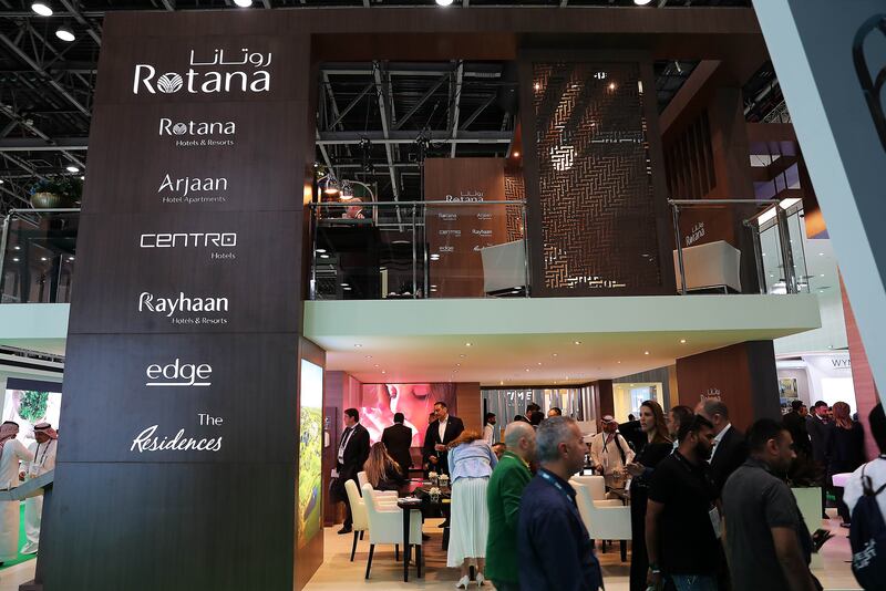 Visitors at the Rotana stand on the third day of the Arabian Travel Market held at the Dubai World Trade Centre. Pawan Singh / The National