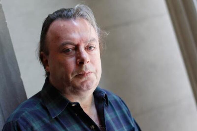 Author Christopher Hitchens poses for a portrait outside his hotel in New York in this June 7, 2010 file photo. Hitchens, 62, dies of complications from esophageal cancer on December 15, 2011, Vanity Fair magazine reported. REUTERS/Shannon Stapleton/Files  (UNITED STATES - Tags: ENTERTAINMENT SOCIETY OBITUARY) *** Local Caption ***  SIN200_PEOPLE-HITCH_1216_11.JPG