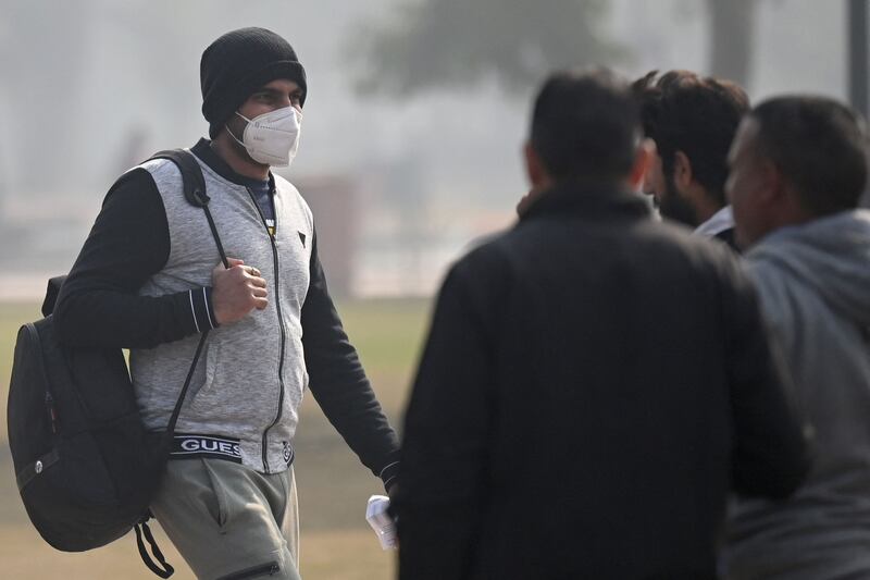 Out and about with a mask in New Delhi last month. AFP