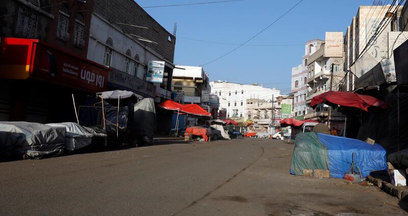 A deserted street and closed shops during an emergency curfew in Sanaa, Yemen. EPA