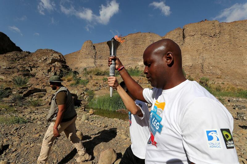 FUJAIRAH , UNITED ARAB EMIRATES , March 4 – 2019 :- Volunteers , officials and staff members of Wadi Al Wurayah with the Special Olympics torch “Flame of Hope” in Wadi Al Wurayah Waterfalls in Fujairah. ( Pawan Singh / The National )
For News/Online/Instagram/Big Picture. Story by Ruba
