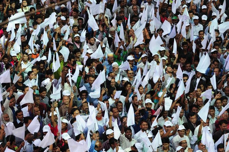 Bangladeshi demonstrators from the Federation of Bangladesh Chambers of Commerce and Industry (FBCCI) protest against unrest in Dhaka. Munir Uz Zaman / AFP





