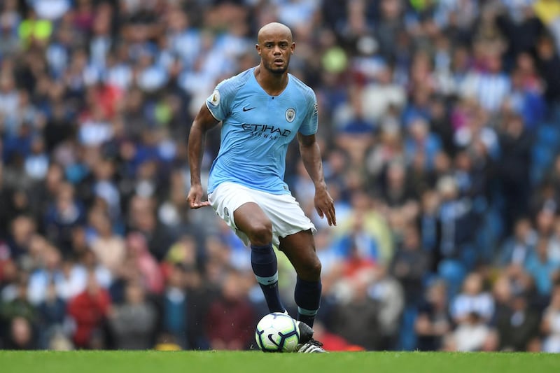 MANCHESTER, ENGLAND - AUGUST 19:  Vincent Kompany of Manchester City in action during the Premier League match between Manchester City and Huddersfield Town at Etihad Stadium on August 19, 2018 in Manchester, United Kingdom.  (Photo by Michael Regan/Getty Images)