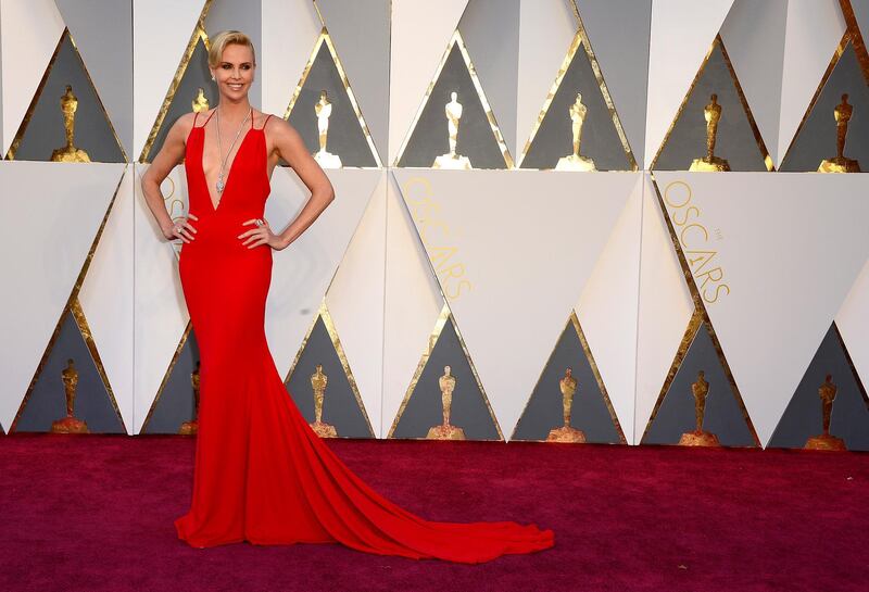 epa05186362 Charlize Theron arrives for the 88th annual Academy Awards ceremony at the Dolby Theatre in Hollywood, California, USA, 28 February 2016. The Oscars are presented for outstanding individual or collective efforts in 24 categories in filmmaking.  EPA/MIKE NELSON