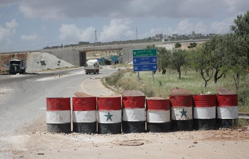 A view shows a checkpoint used by forces loyal to Syria's president Bashar Al Assad in the northwestern city of Ariha, after a coalition of insurgent groups seized the area in Idlib province on May 29. Abed Kontar/Reuters