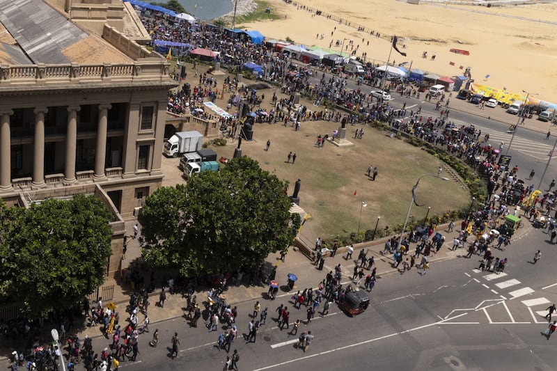 Protesters demand the resignation of Mr Wickremasinghe. Bloomberg