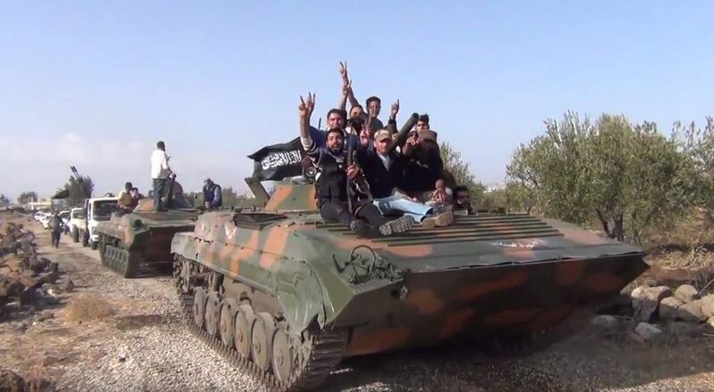 Rebels began a campaign in March against ISIL-affiliated Yarmouk Martyrs Brigade, pictured above in a still from a video, but the effort has failed to make significant progress. Now they hope they can get help from the air. 
