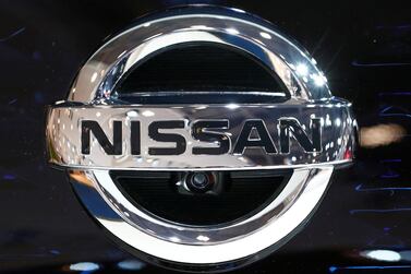 A Nissan logo is pictured at Brussels Motor Show in January 2020.  The company is looking to cut $2.8bn in costs. Reuters