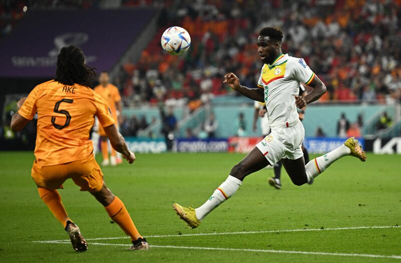 Netherlands' Nathan Ake in action with Senegal's Boulaye Dia. Reuters