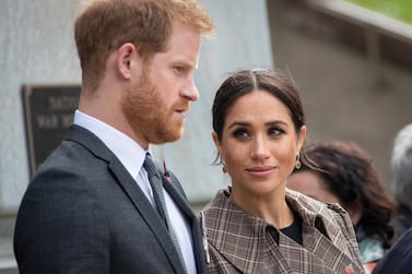 WELLINGTON, NZ - OCTOBER 28: Prince Harry, Duke of Sussex and Meghan, Duchess of Sussex lay ferns and a wreath at the tomb of the Unknown Warrior at the newly unveiled UK war memorial and Pukeahu National War Memorial Park, on October 28, 2018, in Wellington, New Zealand. The Duke and Duchess of Sussex are on their official 16-day Autumn tour visiting cities in Australia, Fiji, Tonga and New Zealand. (Photo by Rosa Woods - Pool/Getty Images)  