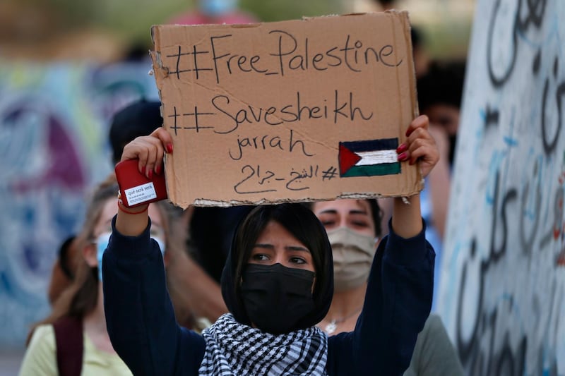A protester chants slogans during a sit-in in support of Palestinians at Martyrs' Square in downtown Beirut, Lebanon. AP