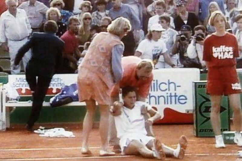 The recent threat to Roger Federer's life brings back memories of Monica Seles, who was stabbed by a fan of Steffi Graf's. Seles, above, is being helped while others grab a man, who had leaned out of the stands at the Hamburg tennis tournament on April 30, 1993. Seles recovered eventually to play tennis again but never seemed the same player after the incident.