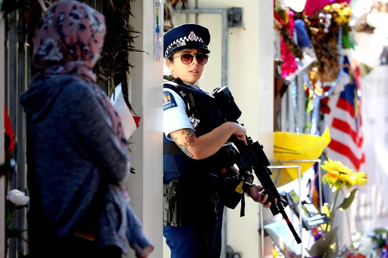 An armed police officer stands guard outside the Al Noor mosque during Friday prayers in Christchurch on May 3, 2019, ahead of the holy month of Ramadan. The death toll from the Christchurch mosque attacks has risen to 51 after a 46-year-old Turkish man succumbed to injuries sustained in the March 15 shootings, the New Zealand prime minister said on May 3. / AFP / Sanka VIDANAGAMA
