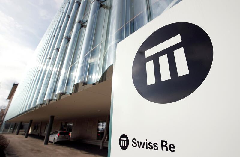 FILE PHOTO: The logo of insurance company Swiss Re is seen in front of its headquarters in Zurich, Switzerland February 12, 2019.  REUTERS/Arnd WIegmann/File Photo